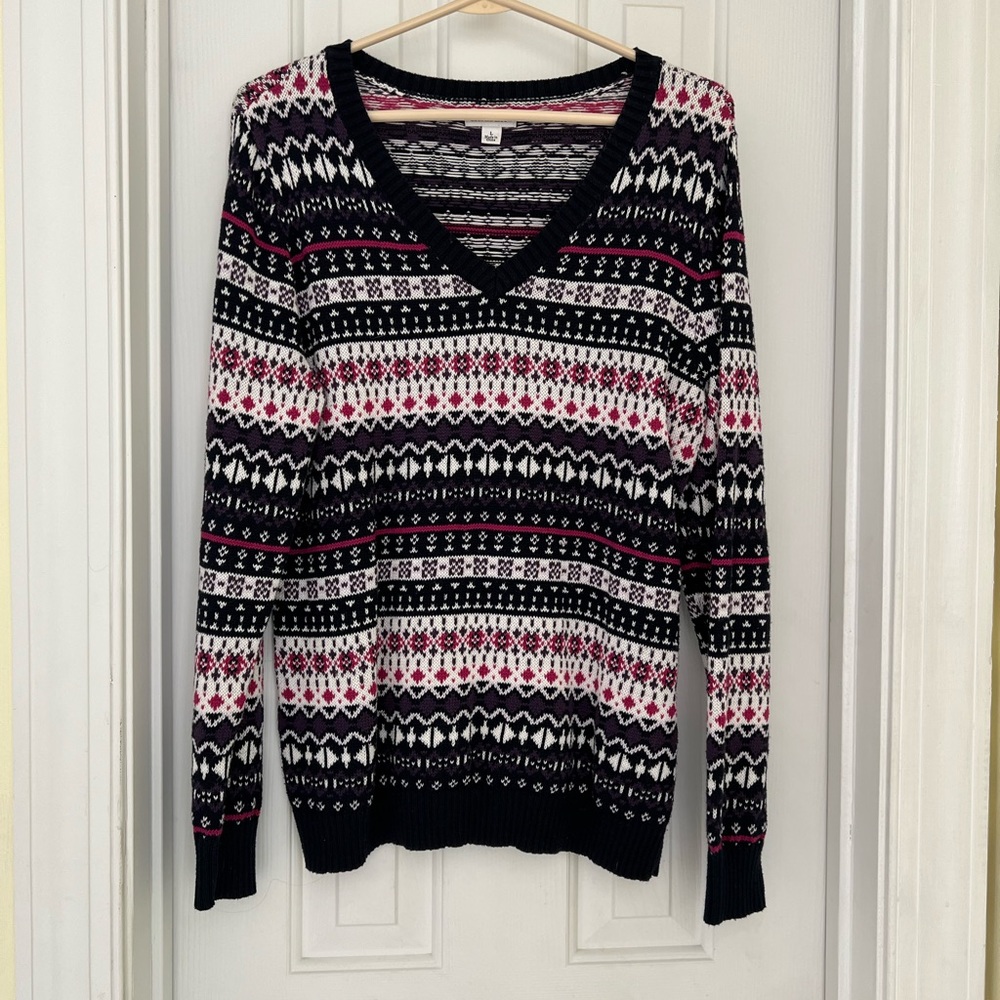 Multi colored sweater. Navy, pink, purple black and white. Long sleeves.